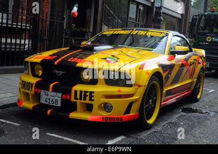 London, UK, 28 August 2014, Customised Kuwaiti cars in London streets. Ford Mustang Credit:  JOHNNY ARMSTEAD/Alamy Live News Stock Photo