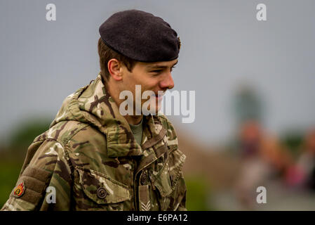 Portrait of a Royal Logistics Corps bomb disposal ammunition technician person attending a British beach WWII bomb scare scene Stock Photo