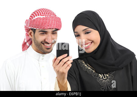 Arab couple sharing social media on the smart phone isolated on a white background Stock Photo