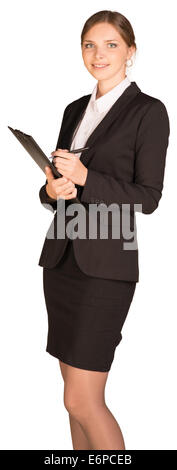 Businesswoman stand holding paper holder and pen Stock Photo - Alamy