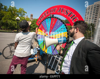 NY Civil Liberties Union's 'Wheel of Justice' game in Washington Square Park in New York Stock Photo