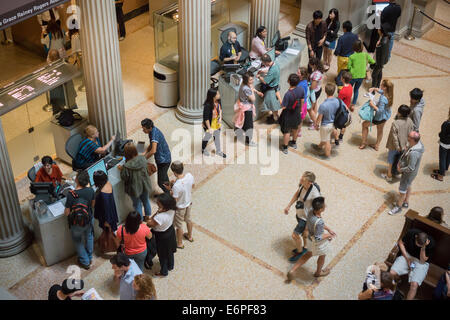 Visitors pay admission to the Metropolitan Museum of Art in New York Stock Photo