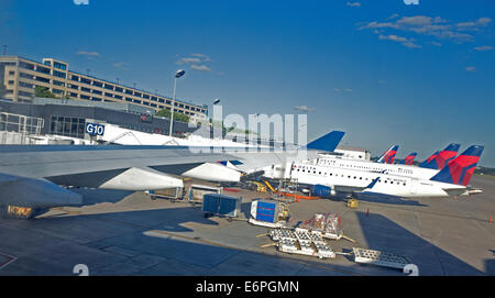 Row of Delta airplanes lined up at Minneapolis - St Paul International airport. Minneapolis Minnesota MN USA Stock Photo