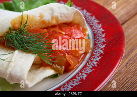 Matbucha with pita. breakfast Maghreb Stock Photo