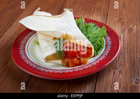 Matbucha with pita. breakfast Maghreb Stock Photo