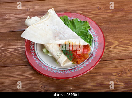 Matbucha with pita. breakfast Maghreb Stock Photo