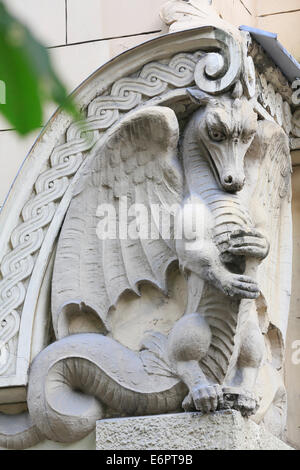 Sculpture of a dragon, Art Nouveau facade of the house Alberta iela 8 or Albert Street 8, architect Mikhail Eisenstein, Riga Stock Photo