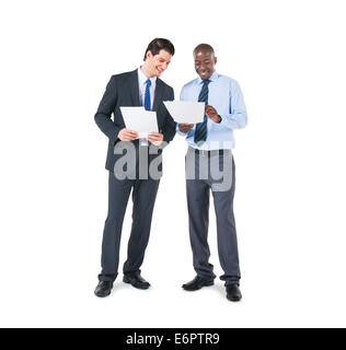 Cheerful Business Colleagues Discussing about the Documents Stock Photo