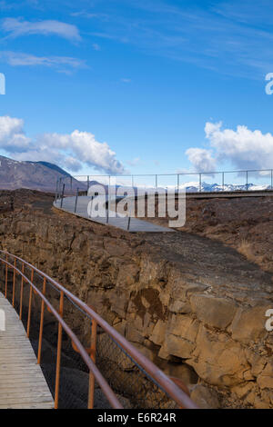 Walkway on the Almannagja tectonic rift in Thingvellir National Park in Iceland Stock Photo