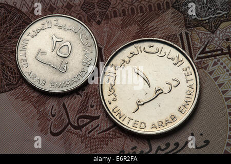 Coins of the United Arab Emirates. UAE one dirham and twenty five fils coins. Stock Photo