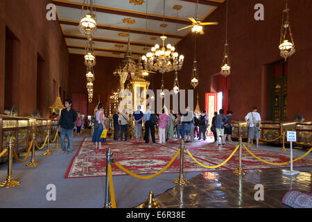 Visitors inside Silver Pagoda, Royal Palace, Phnom Penh, Cambodia Stock Photo