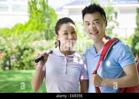 Young couple going to play tennis Stock Photo