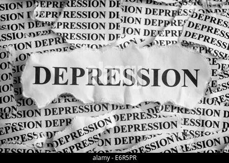 Torn pieces of paper with the word 'Depression'. Concept Image. Black and White. Stock Photo