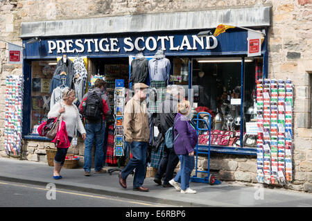 Tourists outside of the Prestige Scotland souvenir shop on the Royal Mile, Edinburgh Stock Photo