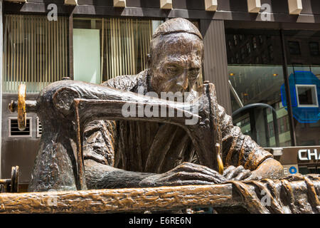The Garment Worker sculpture by Judith Weller, Garment District, 7th Avenue, Manhattan, New York City, New York, USA Stock Photo