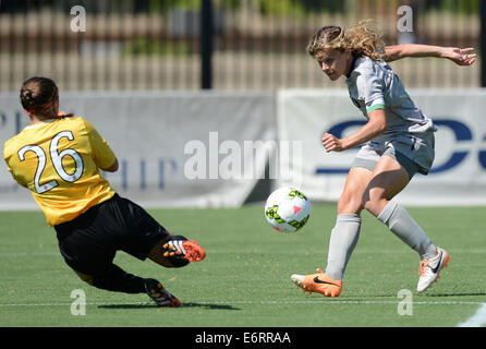 Washington, District of Columbia, USA. 29th Aug, 2014. Georgetown midfielder DAPHNE CORBOZ (6) slips a pass past North Carolina State goalkeeper MACKENZIE STELLJES (26) in the first half at Shaw Field in Washington. Georgetown defeated N.C. State, 6-0. © Chuck Myers/ZUMA Wire/Alamy Live News Stock Photo