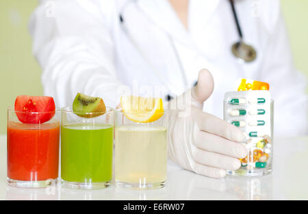 Doctor nutritionist in office with healthy fruits diet concept Stock Photo