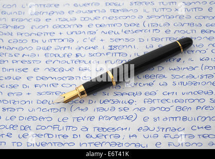 fountain pen on a sheet written by hand Stock Photo