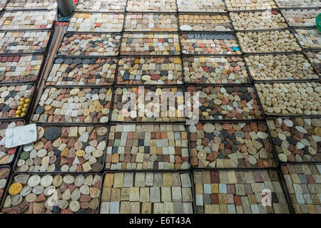 Buddhist amulets for sale at the Amulet Market in Bangkok, Thailand Stock Photo