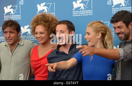 Venice, Italy. 30th Aug, 2014. The crew of the movie 'Senza Nessuna Pieta' pose during the photo call at the 71st Venice Film Festival in Lido of Venice, Italy, Aug. 30, 2014. Credit:  Liu Lihang/Xinhua/Alamy Live News Stock Photo