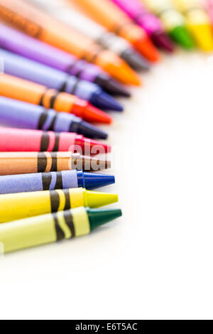 Multicolored crayons on a white background. Stock Photo