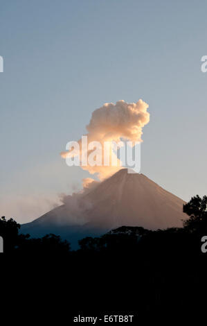 Plume erupting from Volcan El Feugo/ de Colima a volcano in Mexico Stock Photo