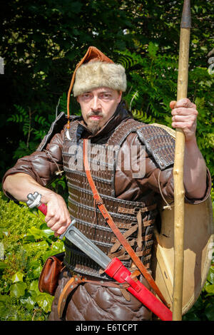 Period actor and Viking re-enactment enthusiast dressed in the war outfit of a 13th century Viking warrior, taking part in the V Stock Photo