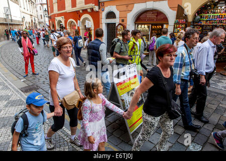 The crowd of people passing in Prague Charles Street Prague Old Town, Czech Republic Prague Karlova Street People walking street city Stock Photo