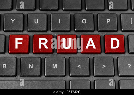 fraud red word on keyboard, Criminal Word Concept Stock Photo