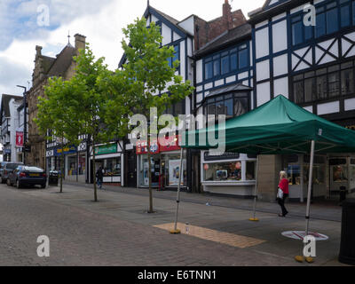 Shops in pedestrianised Standishgate Wigan town centre Greater Manchester England UK Stock Photo