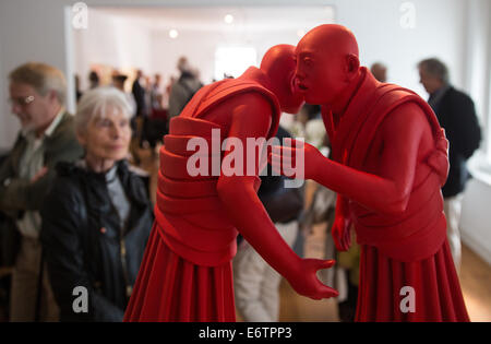 Wedel, Germany. 31st Aug, 2014. Visitors look at works of Chinese sculptor Wang Shugang at the exhibition 'Wang Shugang   Beijing Berlin Projekt' at Ernst Barlach Museum in Wedel, Germany, 31 August 2014. The artist will receive the 2014 Ernst Barlach Prize worth 5,000 Euro. Photo: Axel Heimken/dpa/Alamy Live News Stock Photo
