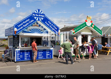 Fish and Chip kiosks at West Bay, Bridport, on the Jurassic Coast in Dorset Stock Photo