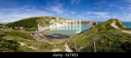 Panoramic wide shot of Lulworth Cove on the Jurassic Coast in Dorset England. Stock Photo