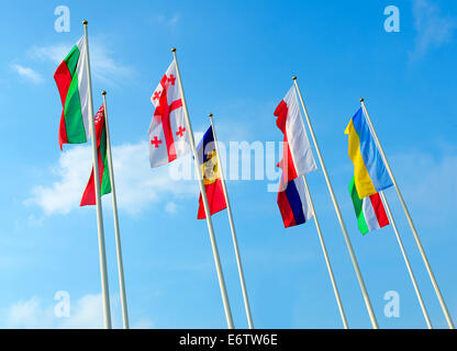 Flags of the different countries against the blue sky Stock Photo