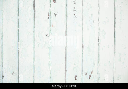 Old and peeled wooden rustic background in mint green color. Stock Photo