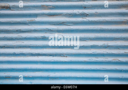 Surface of an old tin painted background - used, weathered and old in blue color. Stock Photo
