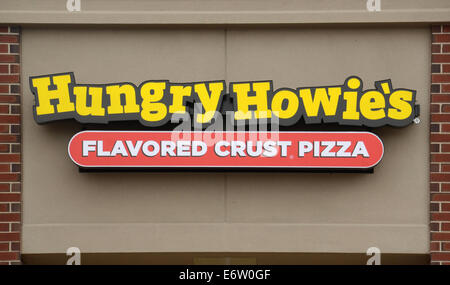 ANN ARBOR, MI - AUGUST 24: Hungry Howie's logo at their east Ann Arbor store is shown on August 24, 2014. Stock Photo