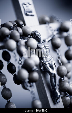 Blue toned Jesus rosary Stock Photo