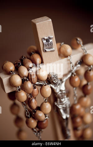 Figurine of Jesus in wood rosary Stock Photo