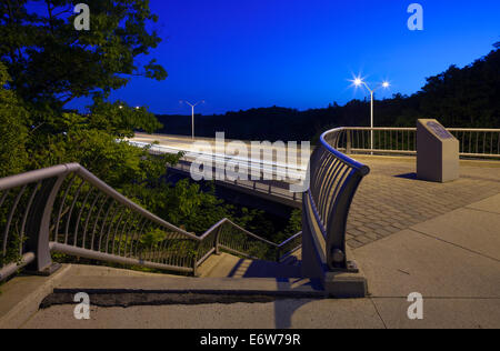A stairwell that leads to the Smith-Triller Viaduct that crosses 16 Mile Creek along Dundas Street at dusk. Oakville, Ontario, C Stock Photo