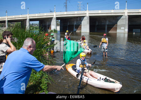 LA, CA, USA. 30th Aug, 2014. Los Angeles City Council member Tom LaBonge getting ready to start the race with its first participant, Ed Begley Jr. The 1st annual LA River Boat Race was held on August 30, 2014 on a 3/4 mile course consisting of small rapids and flat water located along a stretch of the river along the Glendale Narrows in the Elysian Valley. Almost a 100 participants competed in a variety of classifications that included Mens and Womens Advanced, Intermediate and Beginners as well as Youth, Tandem and Stand-Up Paddle boat. Credit:  Ambient Images Inc./Alamy Live News Stock Photo