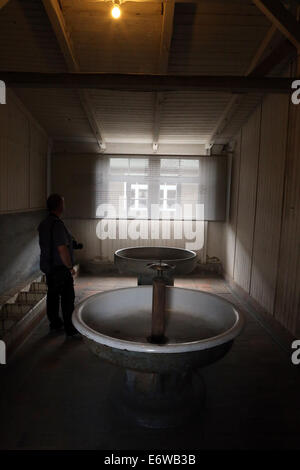 (140901) -- FRANKFURT (GERMANY), Sept. 1, 2014 (Xinhua) -- Photo taken on Aug. 21, 2014 shows the washroom in the former Sachsenhausen Nazi concentration camp in Oranienburg, near Berlin, Germany. The Sachsenhausen Nazi concentration camp was built in Oranienburg about 35 km north of Berlin in 1936 and imprisoned about 220,000 people between 1936 and 1945. The site now served as a memorial and museum to learn about the history within the authentic surroundings, including the remnants of buildings and other relics of the camp. (Xinhua/Luo Huanhuan) Stock Photo