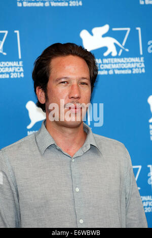 Venice, Italy. 31st Aug, 2014. Actor Reda Kateb poses at the photocall of 'Loin Des Hommes' during the 71st Venice Film Festival in Venice, Italy, 31 August 2014. Photo: Hubert Boesl/dpa/Alamy Live News Stock Photo