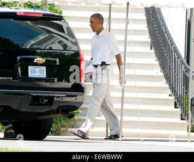 Washington DC, USA. 31st Aug, 2014. United States President Barack Obama departs the South Portico of the White House in Washington, DC on Sunday, August 31, 2014. Credit: Ron Sachs/Pool via CNP Credit:  dpa picture alliance/Alamy Live News Stock Photo