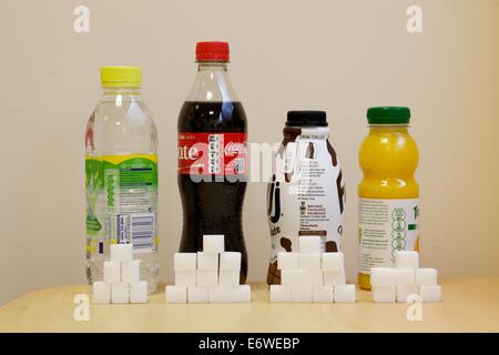 image showing different sugar amounts in soft drinks Stock Photo - Alamy