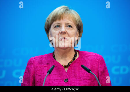 Berlin, Germany. 01st Sep, 2014. German Chancellor Angela Merkel (CDU) speaks at a press conference on the results of the elections in Berlin, Germany, 01 September 2014. Photo: Maurizio Gambarini/dpa/Alamy Live News Stock Photo