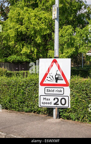 Road works sign skid risk max speed 20 MPH Fen Road Milton Stock Photo