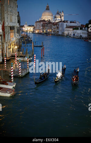 Gondoliers near Ponte dell'Accademia bridge, Canal Grande, Venice, Italy Stock Photo