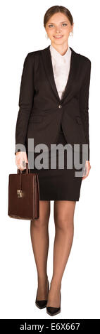 Isolated young business woman walking Stock Photo - Alamy