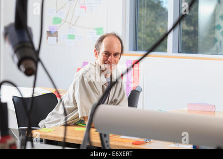 Engineering instructor with Aspergers in project fabrication lab Stock Photo